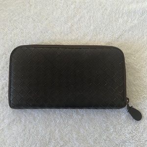 Bottega intrecciato continental wallet. Width: 7.5".Depth: 1.25".Height: 4.25".